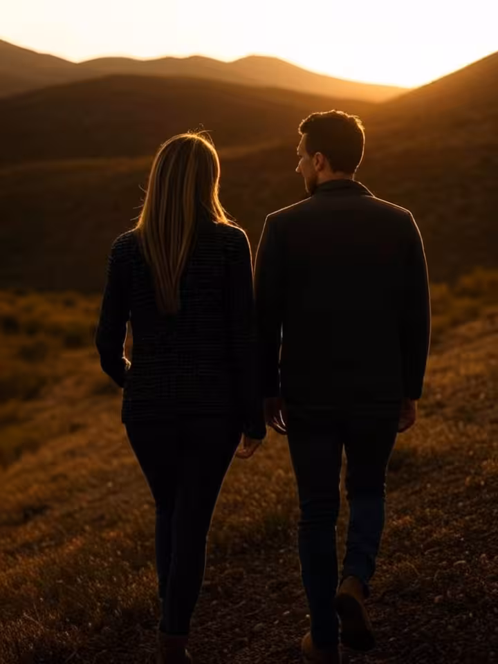 Elegant couple hiking scenic desert trail at sunrise, McDowell Mountains landscape, sophisticated ca